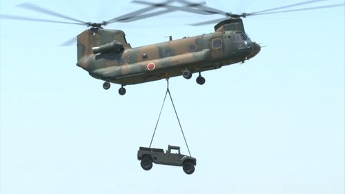 JGSDF Equipment CH-47 and HMV.jpg